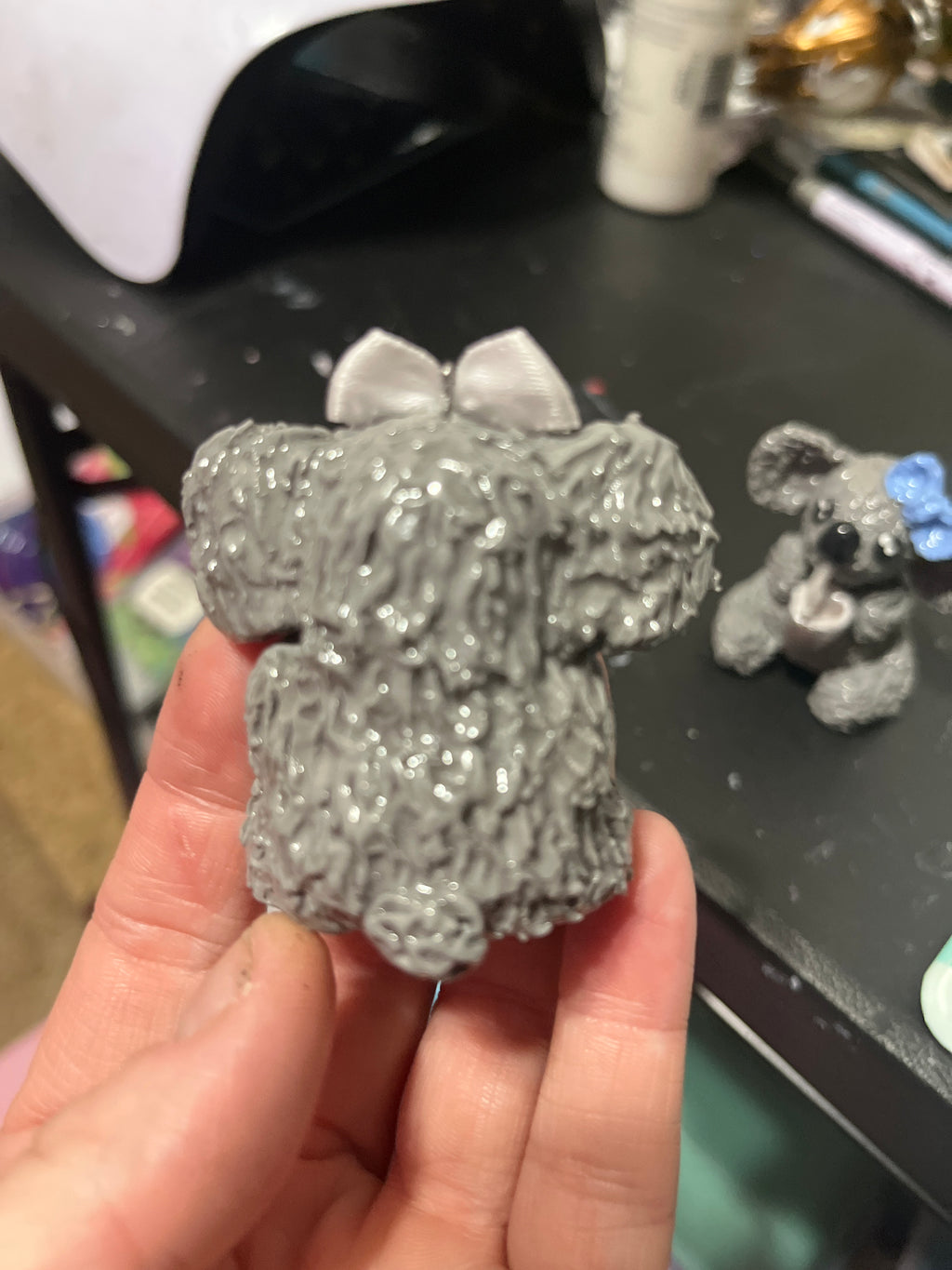 Koala clay figurine with cloth bow